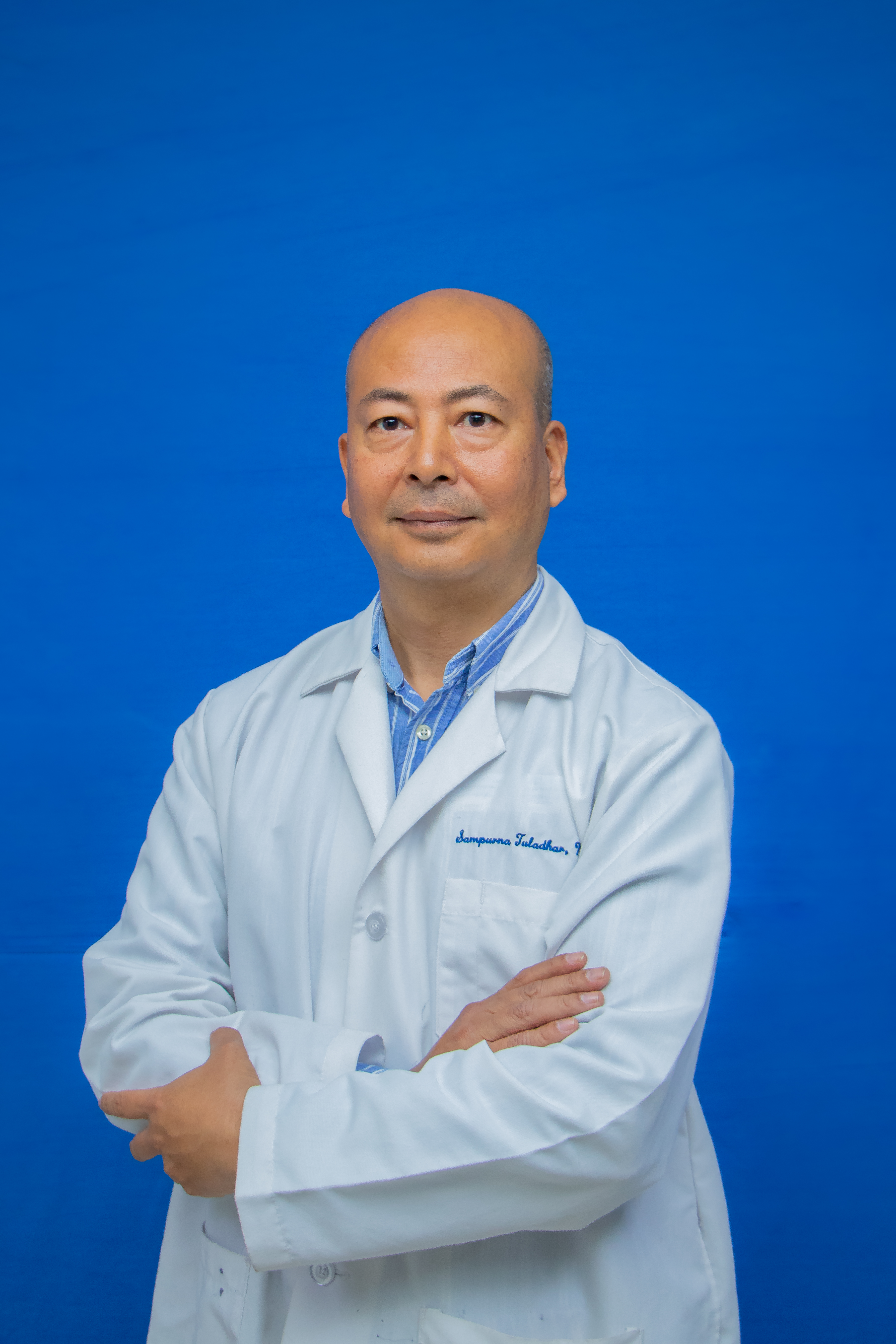 Dr. Sampurna Man Tuladhar